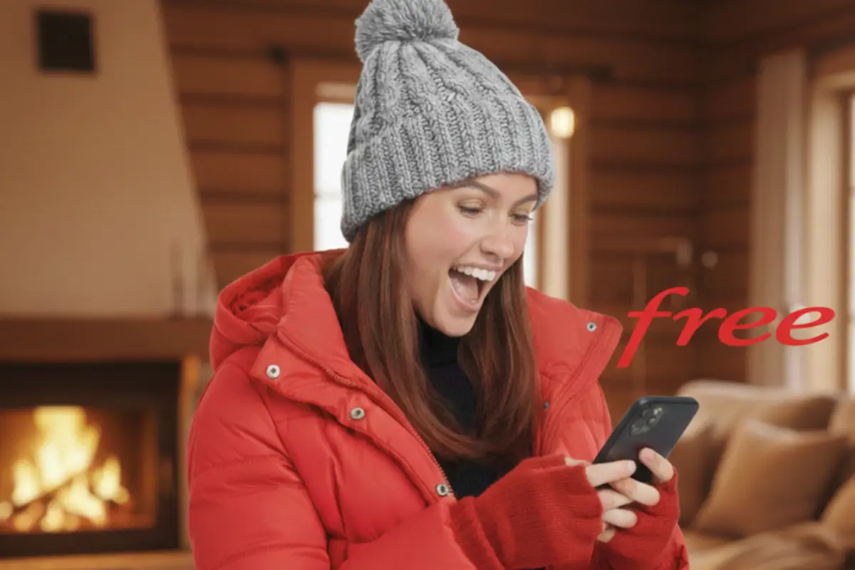 Femme à bonnet avec logo de Free sourit, ravie de son forfait offert
